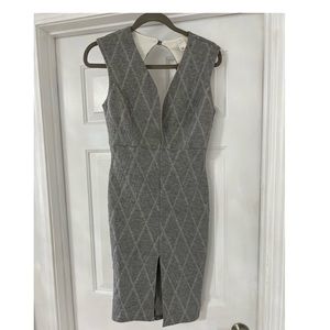 **Brand New** Women’s size medium gray Deep V dress.